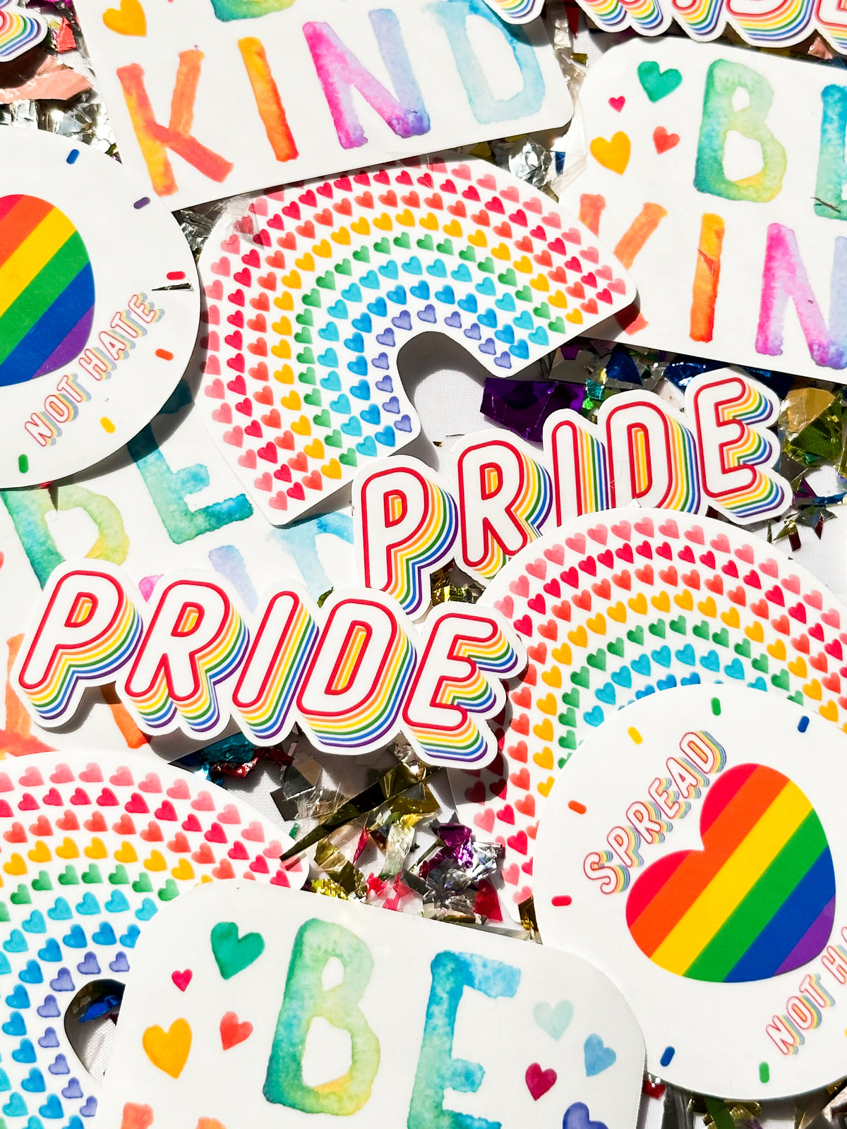 mix of brightly colored rainbow LGBTQIA+ pride stickers