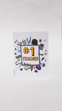 video-Number One Teacher Appreciation Card,Best Teacher Ever Card,Preschool Teacher Card,#1 Teacher Card,Teacher Gift Ideas, Made in USA. Teacher Items organized around the card. Bold letters depicting #1 Teacher