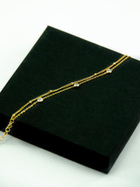 14K gold two layer chain bracelet with crystal charms