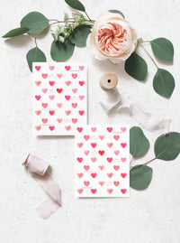 red pink hearts with valentine's day sayings on valentine's day greeting card