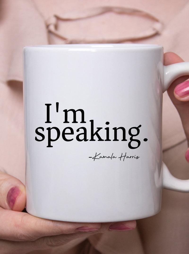 Kamala Harris i am speaking lettering on face of the mug. 11 oz. mug with  C handle Sublimation process used