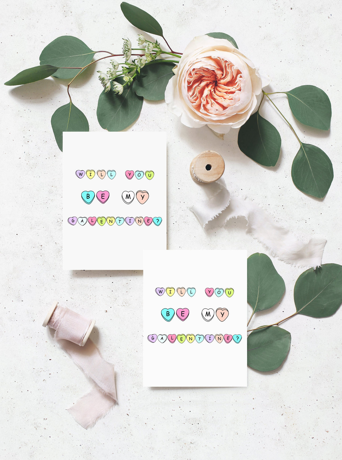 will you be my galentine? written out in colorful heart candy on white greeting card